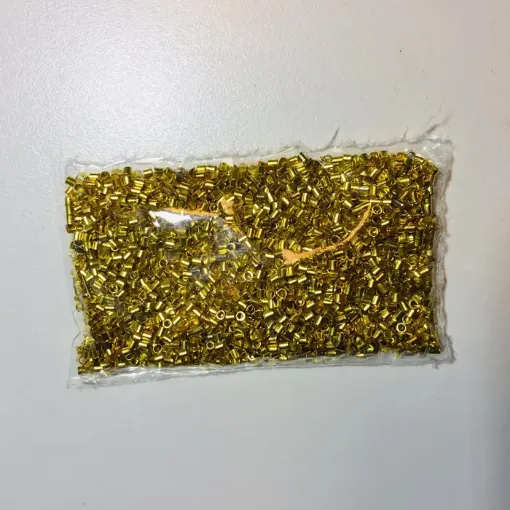 Imagen de Separador metalico chato mini de 2mms. *20grs. Oro