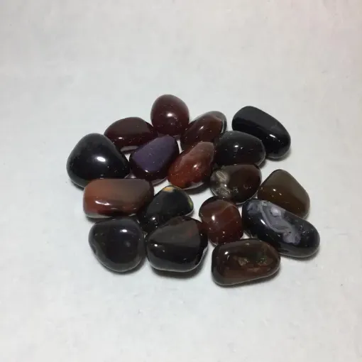 Imagen de Piedras semi preciosas Agata Marron Oscuro rolada piedras de 2 a 3cms en paquete de 100grs