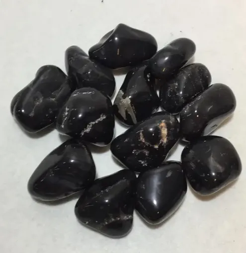 Imagen de Piedras semi preciosas Onix rolado piedras de 2 a 2.5cms en paquete de 100grs