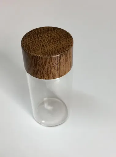 Imagen de Frasquito de vidrio con tapa de madera RB12580 de 2,5*5cms. *unidad