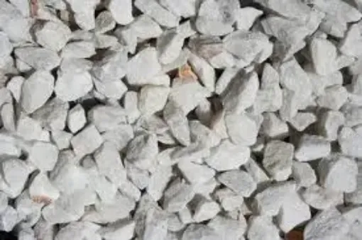 Imagen de Marmolina blanca (granito) en bolsa de 1kg Nro.4 piedras de 14 a 20mms aprox