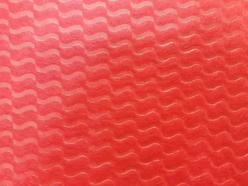 Imagen de Tnt estampado para manualidades de 70x100cms modelo ondas color rojo