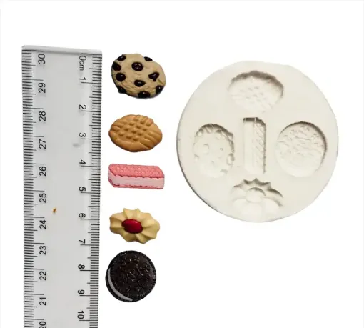 Imagen de Molde de silicona para resina y masas no.077 modelo 5 galletitas diferentes de 2cms. aprox.