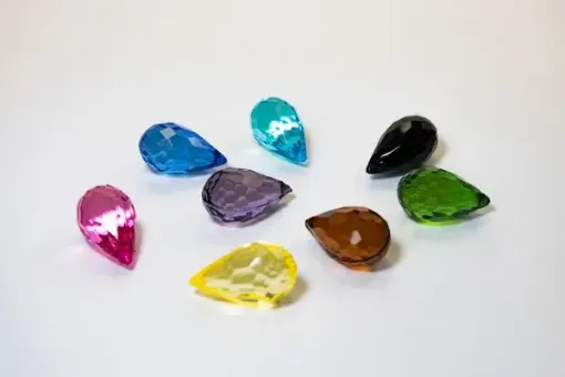 Imagen de Piedra cairel gota grande 3d de 3*1.8cms paquete x10 unidades color Morado purpura