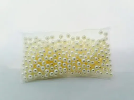 Imagen de Perlas con agujero sueltas de color blanco perlado en paquete de 25grs medida 5mms