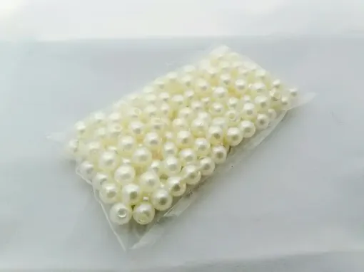 Imagen de Perlas con agujero sueltas de color blanco perlado en paquete de 25grs medida 8mms