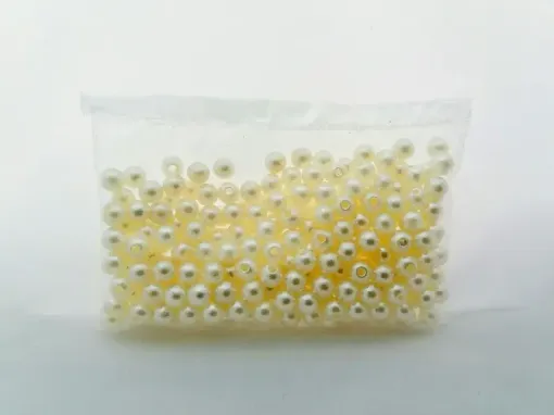 Imagen de Perlas con agujero sueltas de color blanco perlado en paquete de 25grs medida 6mms