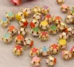 cascabeles metalicos flores colores 18 mms multicolor por 12 unidades surtidas 1