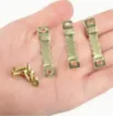 gancho colgador dentado metalico sierra para cuadros medida 44x8mms tornillos dorado por 10 unidades 2