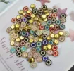 aplique metal fomra flor 13mms brillos por 5 unidades varios colores 1