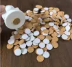 etiquetas adhesivas corcho circular medida 9x2mms por 100 unidades 0