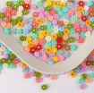 apliques resina flores colores 6mms x100 unidades 1