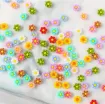 apliques resina flores colores 6mms x100 unidades 2