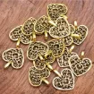 dije metal forma corazon calado 16x14mms por 15 unidades color dorado 0
