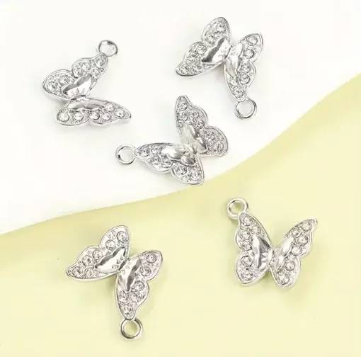 dije colgante metalico modelo mariposa strass medida 16x15mms x5 unidades color plateado 0