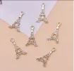 dije colgante metalico modelo torre eiffel strass medida 24x14mms x5 unidades color dorado 0