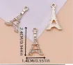 dije colgante metalico modelo torre eiffel strass medida 24x14mms x5 unidades color dorado 1