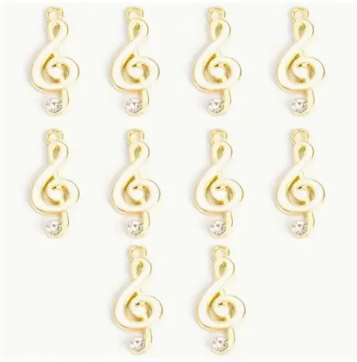 dije colgante metalico modelo clave sol strass medida 22x10mms x5 unidades color dorado blanco 0
