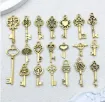 dije colgante metalico modelo llaves medida 10 30mms x10 unidades surtidas color oro antiguo 0