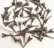dije colgante metalico modelo torre eiffel 3d medida 8x6x24mms x10 unidades varios colores surtidos 5