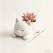 pieza impresion 3d abs modelo maceta gatito acostado medida 73x75x51mms color blanco 1