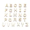 set 26 dijes acero inoxidable modelo alfabeto abecedario letras 11x8mms x26 color dorado 0
