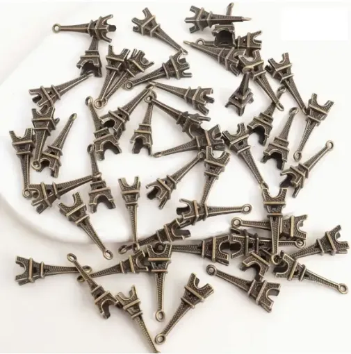 dije colgante metalico modelo torre eiffel 3d medida 8x6x24mms x10 unidades color oro viejo 0