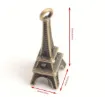 dije colgante metalico modelo torre eiffel 3d medida 8x6x24mms x10 unidades color oro viejo 2